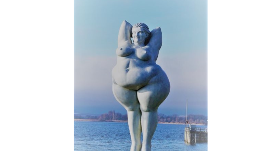 Photograph of a statue - a naked full-figured female on the beach. from: PWCD - body confident