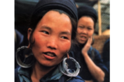 Color photograph of Asian women with a hat and very large earrings. from: PWCD - Gender in Southeast Asia